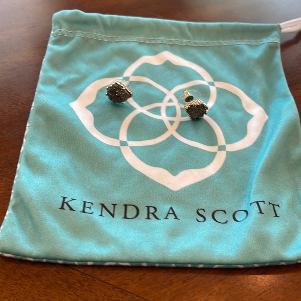 Kendra Scott earrings.